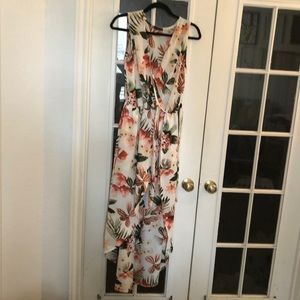 Floral print jumpsuit with high front low back